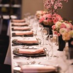 Table view showing place settings at a Paris themed dinner