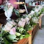 Gorgeous fresh floral garland at a high tea event